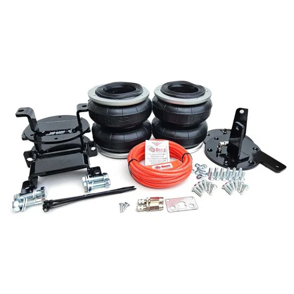 Air suspension kit components laid out: two black airbags, mounting brackets, orange air hose, screws and fittings, and hardware.